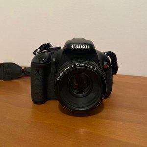 Canon EOS Rebel T3i DSLR Camera with two lenses and bag